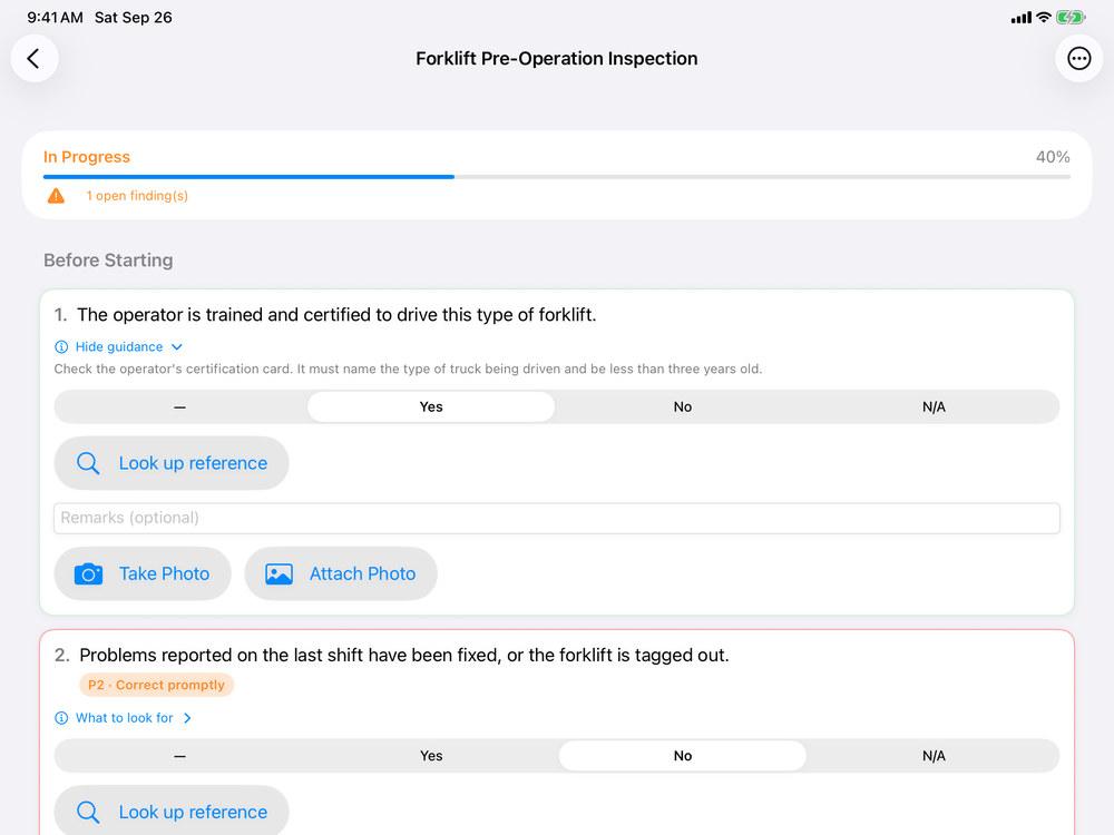 Guardian Checklist working through a forklift pre-operation inspection, with built-in guidance, reference lookup and photo capture for each question.